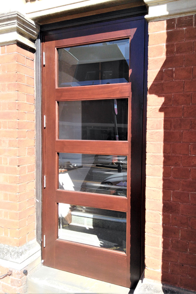 Close up of door with glass panels by Dunstable Joinery